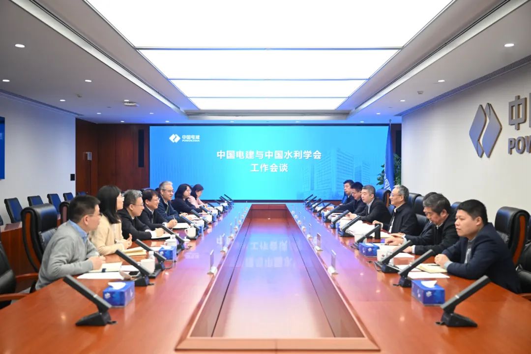 中国电建党委副书记王斌与中国水利学会秘书长段虹会谈